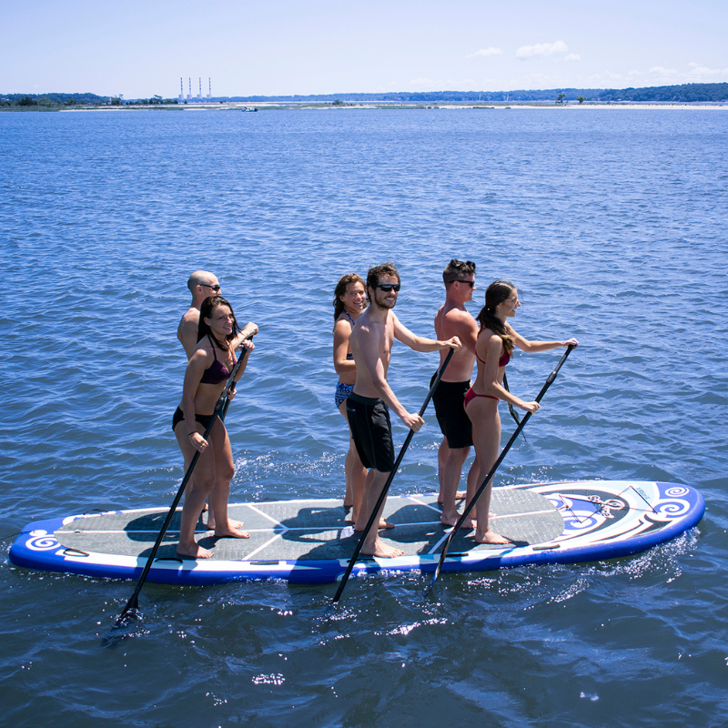 Solstice 16' Maori Giant Inflatable Paddleboard Multi-person SUP with Leash & 4 Paddles in the water
