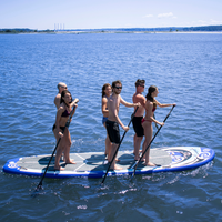 Thumbnail for Solstice 16' Maori Giant Inflatable Paddleboard Multi-person SUP with Leash & 4 Paddles in the water