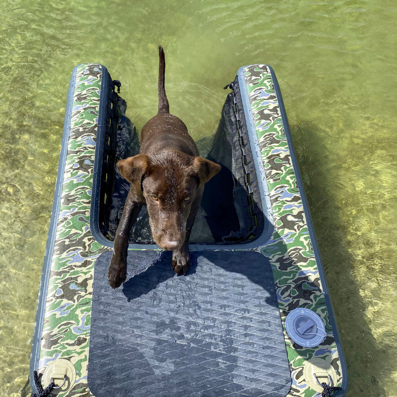 Solstice Sport Inflatable Pup Plank - XL Camo in the water